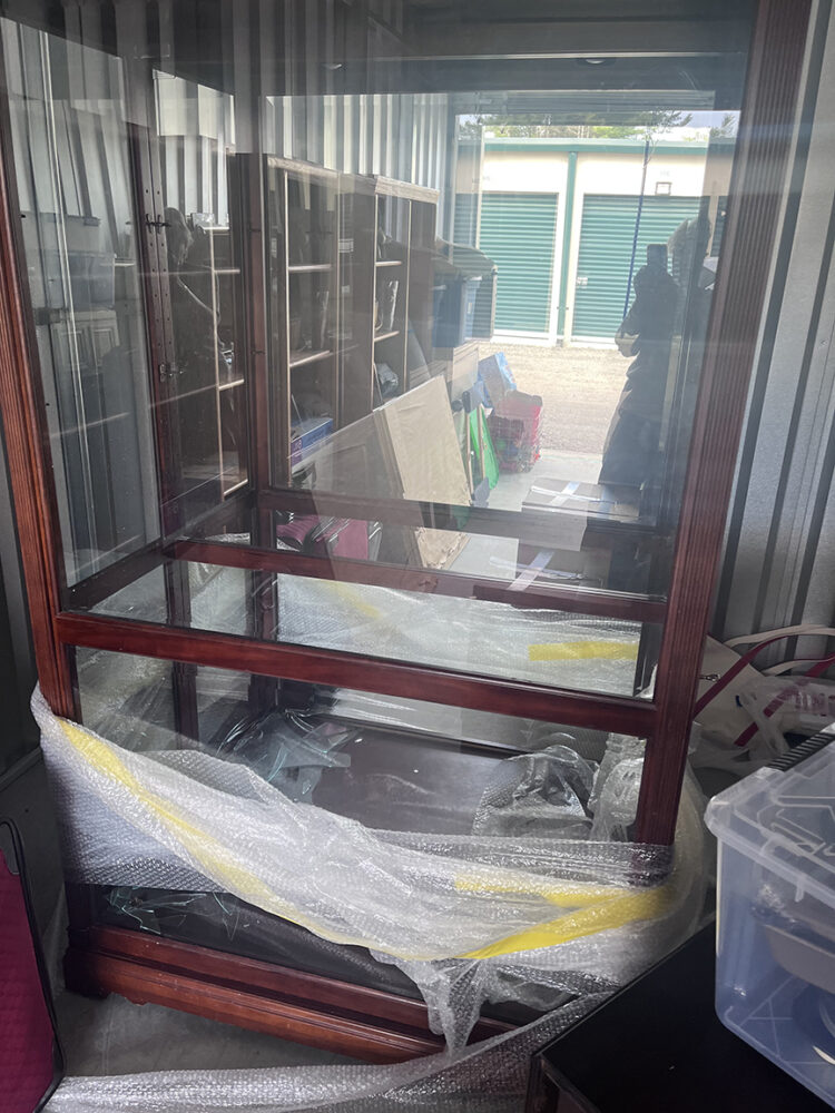 4-5 ft wide all glass curio cabinet