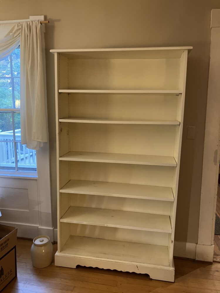 tall white wooden bookcase